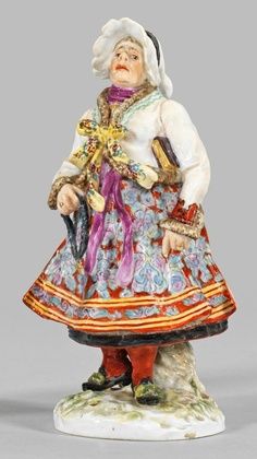 Фарфоровая фигура женщины в традиционном пильзенском костюме