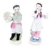 Две статуэтки: мальчик с бубном и танцующая девочка