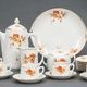Porcelain tea - coffee set for 5 persons - teapot; cream pot; sugar-basin; 5 cups; a serving dish; two size of saucers