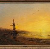 На пляже, двухмачтовый корабль пришвартован при закате солнца