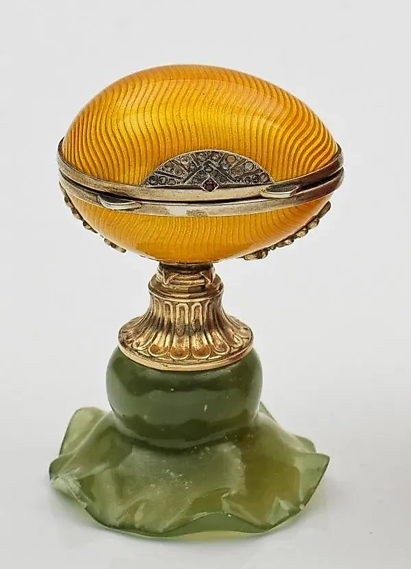 Small, decorative egg container.