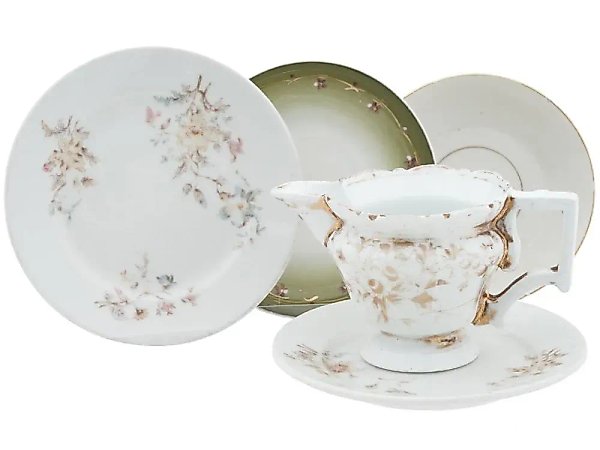 Russian cups and teapot of Kuznetsov porcelain: an antique collection.