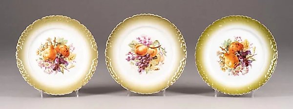 Three plates with a fruit pattern by M.S. Kuznetsov