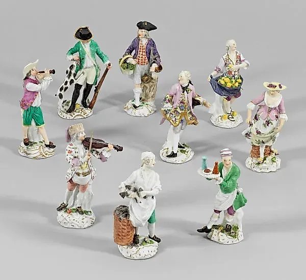 A collection of 18 Meissen porcelain figurines.