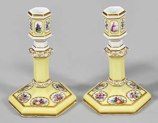 Several candlesticks with Watteau decor and floral ornamentation.