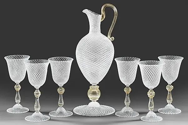 Murano reticello glass jug and six goblets with gold foil inclusions