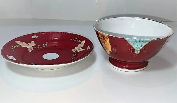 Porcelain bowl and dish with a pink background and a grapevine pattern