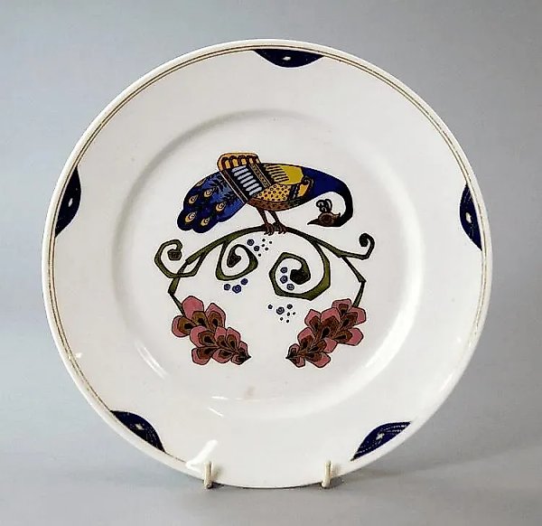 Porcelain plate by M.S. Kuznetsov, circa 1910, with a peacock in the center