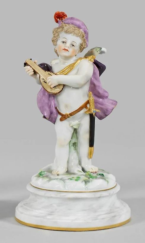Rare porcelain figurine of Cupid with a lute in the role of a minstrel