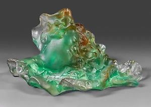 A bowl made of glass mass (or crystal mass) from the Nancy School, featuring the profile of the Roman god Bacchus surrounded by vine leaves.