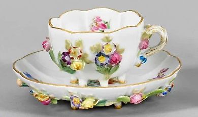 Decorative cup with a flower design