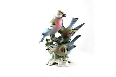 Three birds on a branch