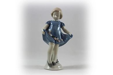 A girl with flowers in her hem