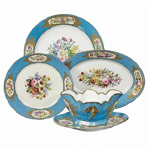 A Russian porcelain dinner service from the 19th century with marks of Alexander II and Kuznetsov.