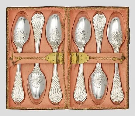 A set of six silver spoons