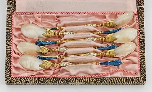 Six caviar spoons.