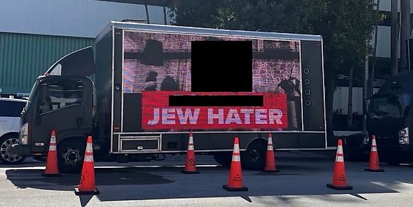 Art Basel Miami Protestors Sue Politician Over ‘Jew Hater’ Billboard