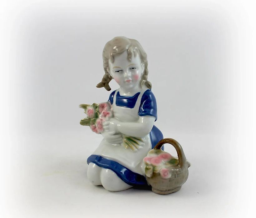 A girl with a basket and a bouquet