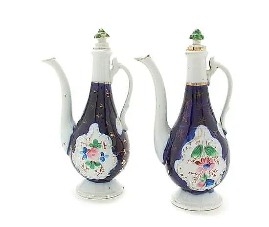 Russian porcelain decanters and jugs by Kuznetsov, 8 3/4 inches tall.