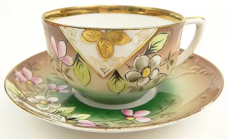 Фарфоровая чашка 