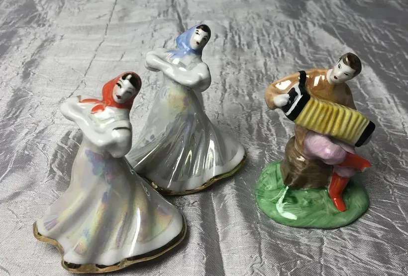 Porcelain figurine. Harmonist and dancers. Dulevo. USSR.