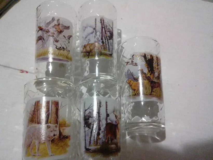 A set of 5 hunting glass goblets.