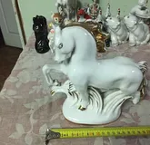 Конь.