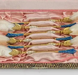 Sentence of six caviar spoons.