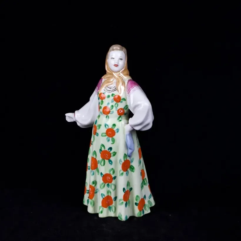 Soviet porcelain figure of a dancing woman “Masha”. Dulevo, 1960s. Height: 20.6 ...