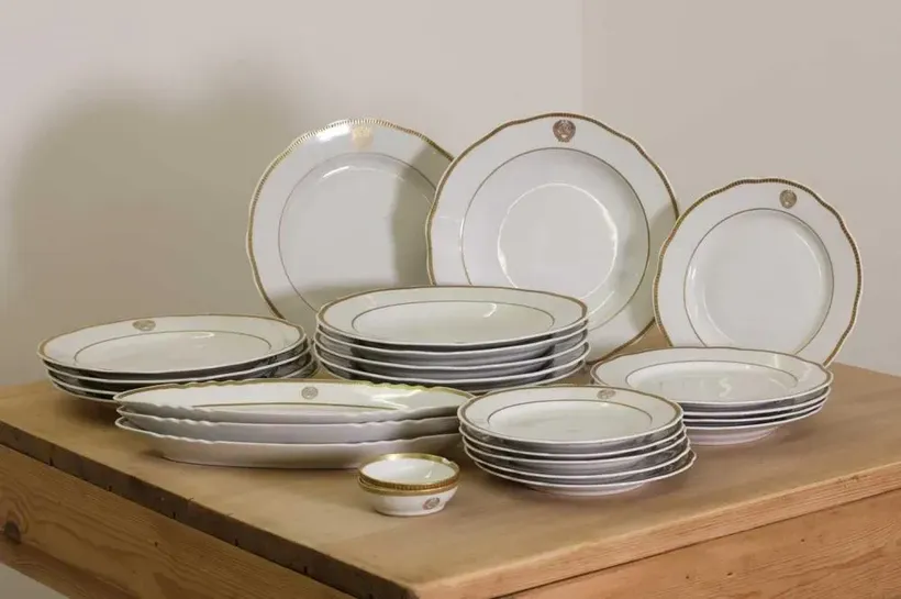 A Soviet state porcelain six setting dinner service from the Russian Embassy in London,