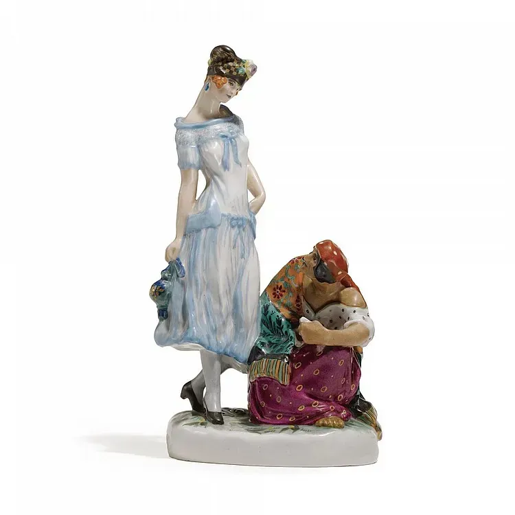 A SOVIET PORCELAIN FIGURAL GROUP: 'THE FORTUNE TELLER', STATE PORCELAIN MANUFACTORY, CIRCA 1925