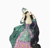 A PORCELAIN FIGURE OF A LADY WITH A MASK
