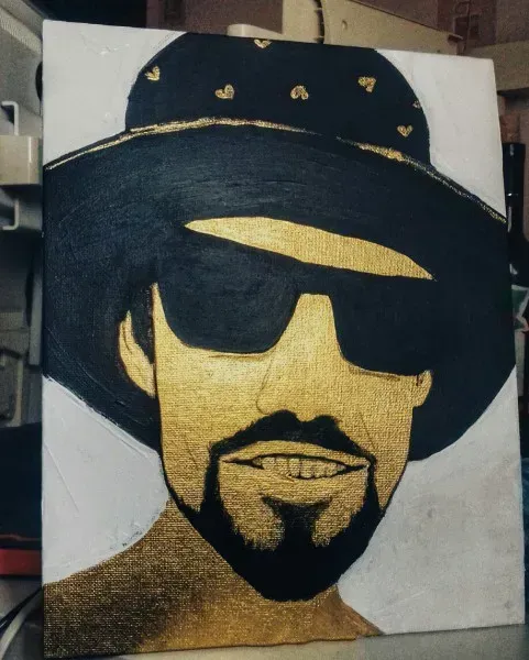 Acrylic canvas guy with a beard.