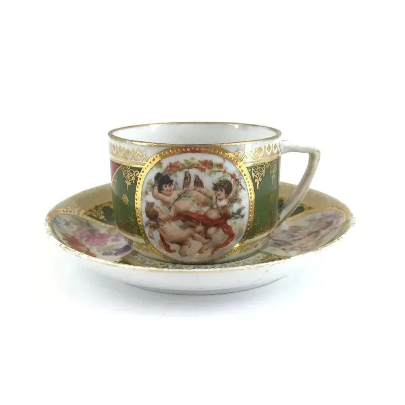 Small cup and saucer. Russia. Kuznetsovs factory in Moscow. The turn of the 19th and 20th centuries.