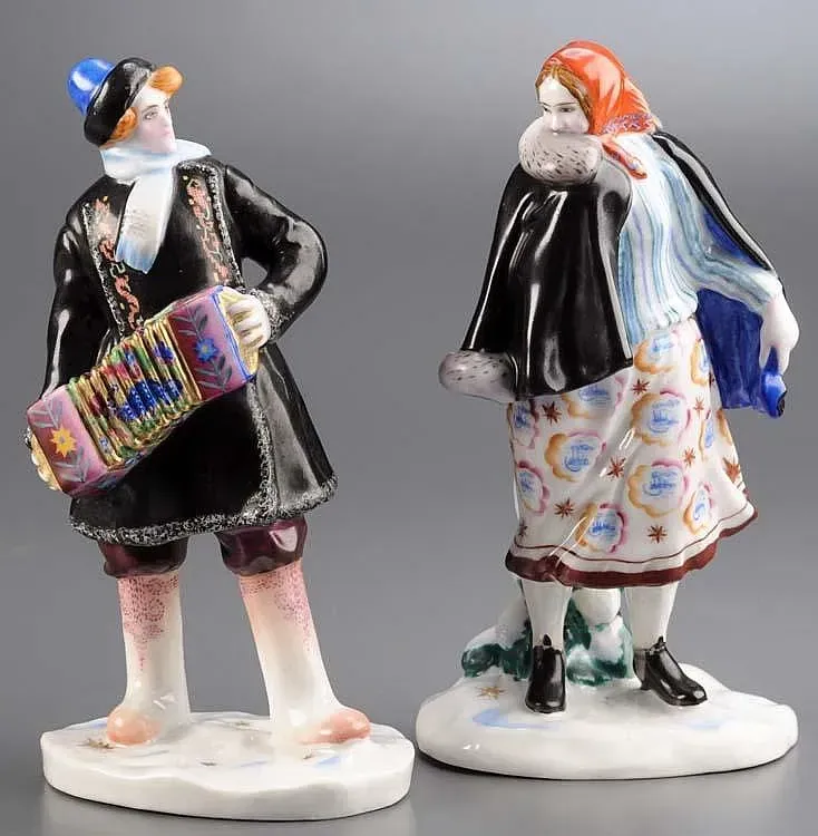 Two Soviet porcelain figures of an accordionist