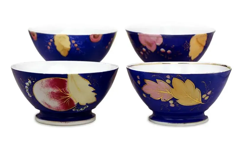 FOUR LARGE BOWLS - Porcelain, cobalt, gilding The factory of M.S. Kuznetsov…