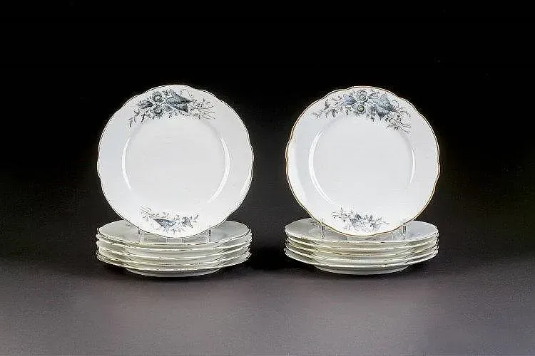 TWELVE PORCELAIN PLATES