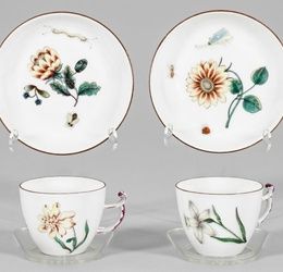 Pair of decorated cups with woodcut flowers