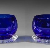 A pair of Saint Louis candle holders with star decoration