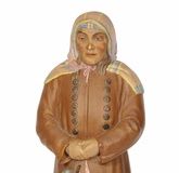 A RUSSIAN BISCUIT PORCELAIN FIGURE OF A SIBERIAN PEASANT