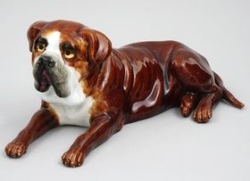 A RUSSIAN PORCELAIN BULLDOG FIGURINE BY M.S. KUZNETSOV FACTORY, CA. 1900