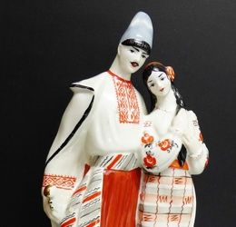 A Kiev Russian porcelain figure group, 20cm high