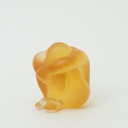 Amber-colored figurine