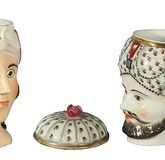 A PAIR OF RUSSIAN PORCELAIN HEAD SHAPED CUPS, one
