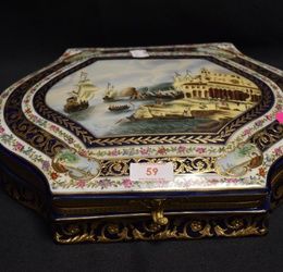 A modern Kuznetsov Russian revival porcelain casket with gilt on cobalt ground with decorated