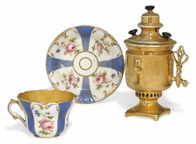 A RUSSIAN PORCELAIN SUGAR-BOWL AND A CUP AND SAUCER