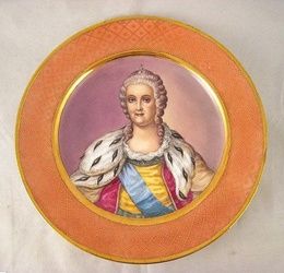 A Russian porcelain Kuznetsov plate, painted with