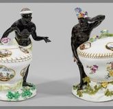 A pair of Meissen Moorish figures with spice bowls.