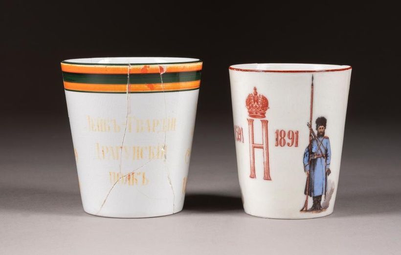 TWO PORCELAIN AND CERAMIC BEAKERS COMMEMORATING THE YEARS 1891 AND 1914