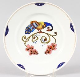 A RUSSIAN M. S. KUZNETSOV PORCELAIN PLATE, decorated in The Art Nouveau style with a peacock,